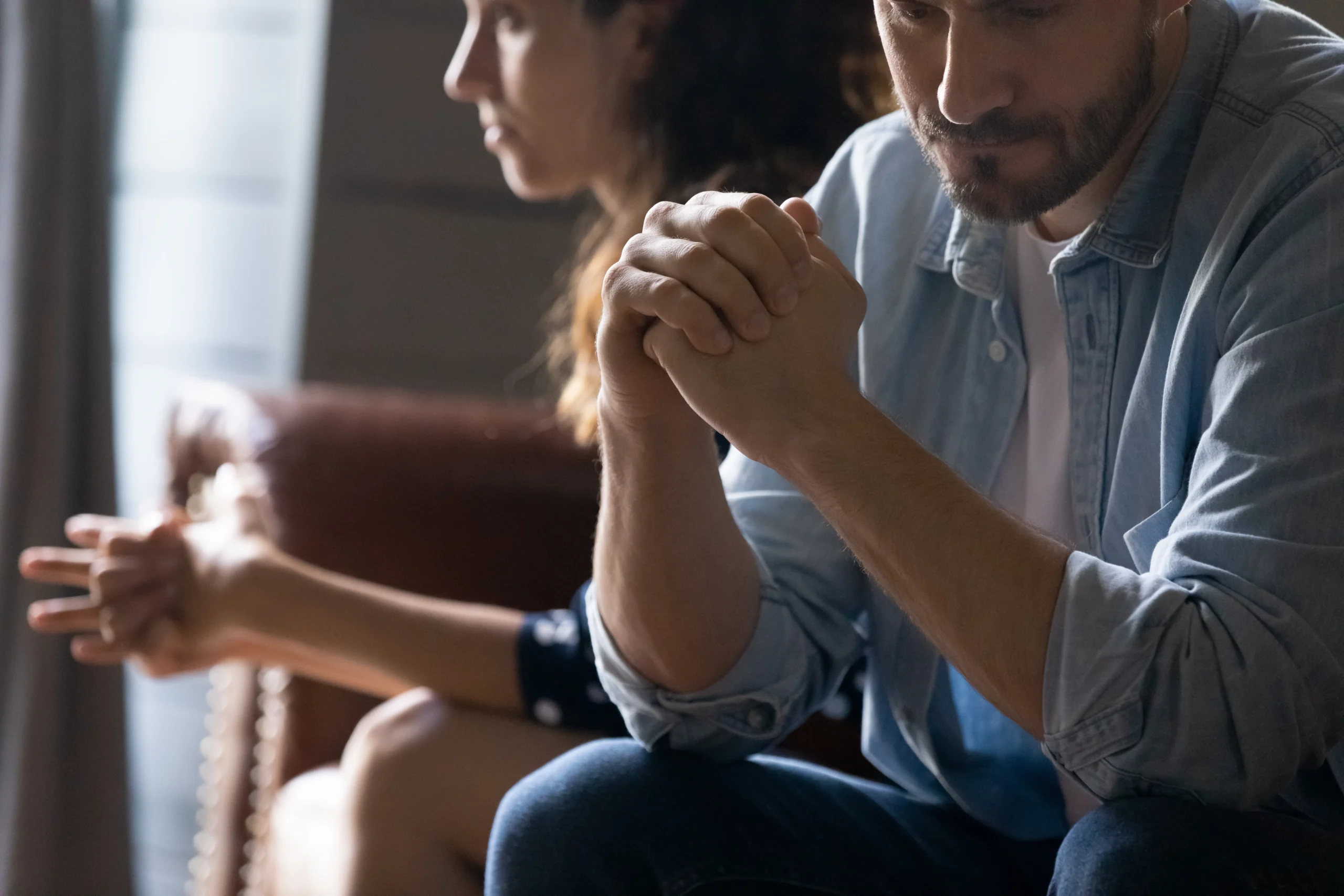 Family therapy session in Norcross, GA with parents and child meeting together with a licensed marriage and family therapist